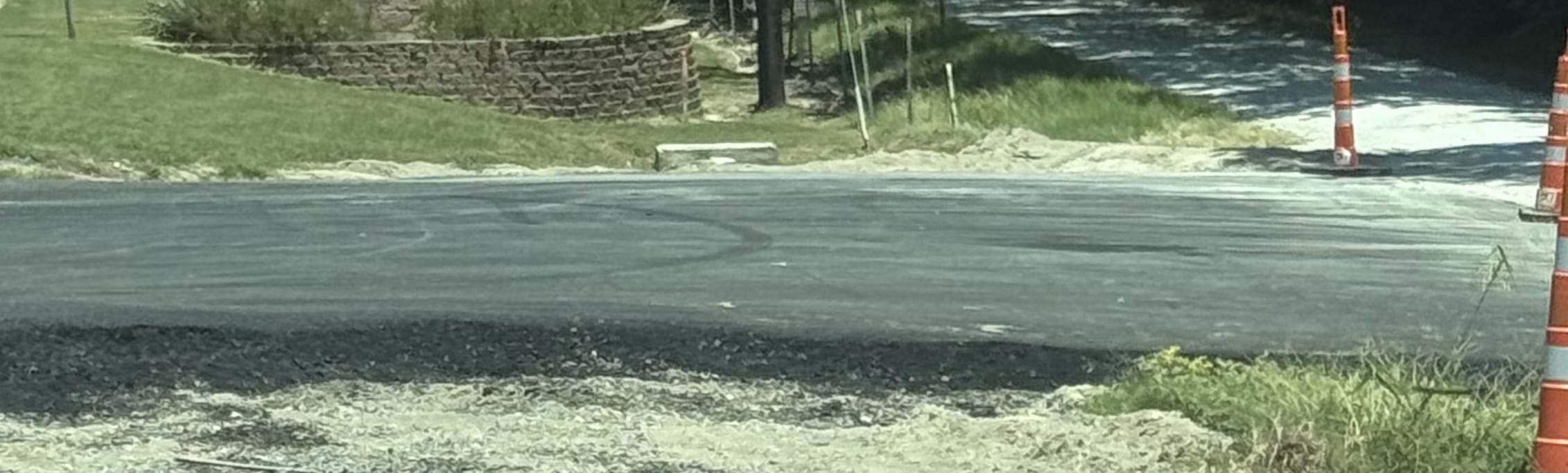 Asphalt Overlay vs. Full Replacement: How to Tell Which Your Lot Needs
