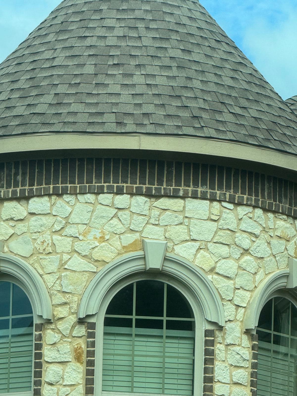 Shingle roof on a stone turret